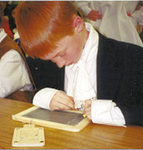 Boy with Slate and Hornbook